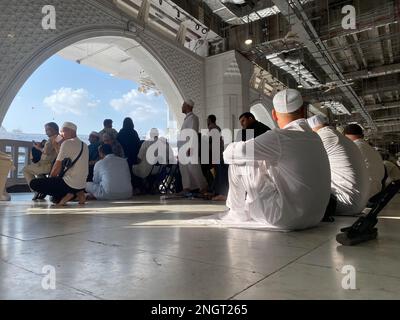 Muslim Pilgrims at The Kaaba in The Haram Mosque of Mecca , Saudi Arabia, Performing Umra and parrying Stock Photo