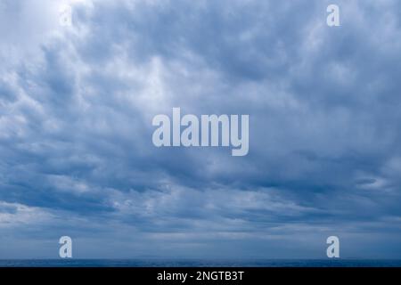 Blue sky background with clouds, Natural sky background with tiny clouds. Stock Photo