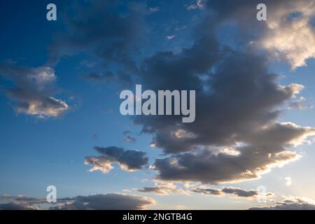Blue sky background with clouds, Natural sky background with tiny clouds. Stock Photo