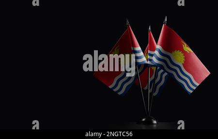 Small national flags of the Kiribati on a black background. Stock Photo