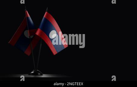 Small national flags of the Laos on a black background. Stock Photo