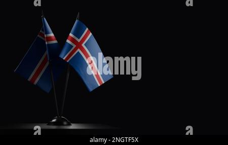 Small national flags of the Iceland on a black background. Stock Photo