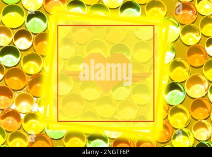 yellow glow frame as copy space on yellow abstract balls background Stock Photo
