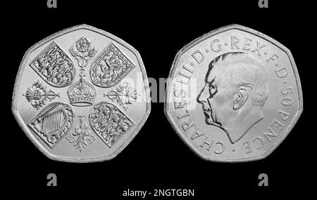 The new 50 pence coin featuring the first coin portrait of King Charles III by Martin Jennings. The reverse side features the 1953 Coronation Crown Stock Photo