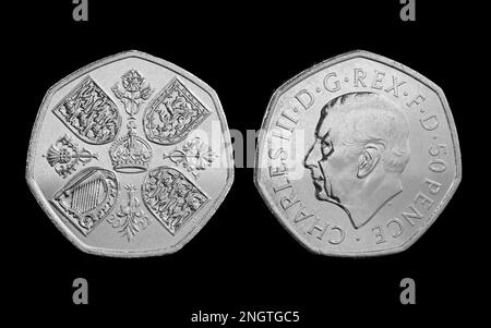 The new 50 pence coin featuring the first coin portrait of King Charles III by Martin Jennings. The reverse side features the 1953 Coronation Crown Stock Photo