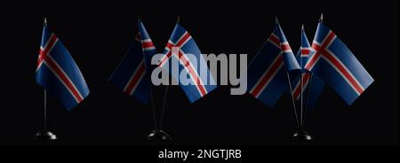 Small national flags of the Iceland on a black background. Stock Photo