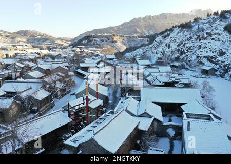 Beijing, China. 19th Feb, 2023. This aerial photo taken on Feb. 19, 2023 shows snow scenery of the Gubei Water Town in Beijing, capital of China. Credit: Chen Yehua/Xinhua/Alamy Live News Stock Photo