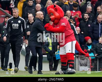 Manchester, UK. 19th Feb, 2023. Erik ten Hag manager of Manchester United greeted by Fred the Red mascot during the Premier League match at Old Trafford, Manchester. Picture credit should read: Andrew Yates/Sportimage Credit: Sportimage/Alamy Live News Stock Photo