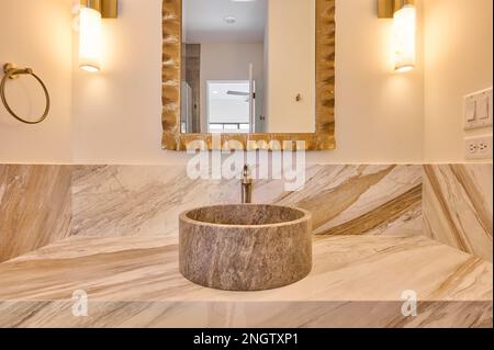 Straight view of bathroom vanity sink and mirror Stock Photo