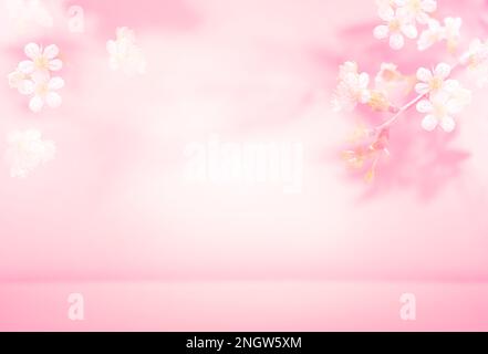 Spring summer blurred light pink background with shadow of the tree leaves and flowers on a wall. Abstract Spring Summer scene for product presentatio Stock Photo
