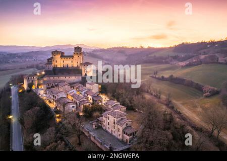 Panoramic aerial view of Torrechiara Castle during winter sunset. Parma, Italy. Stock Photo