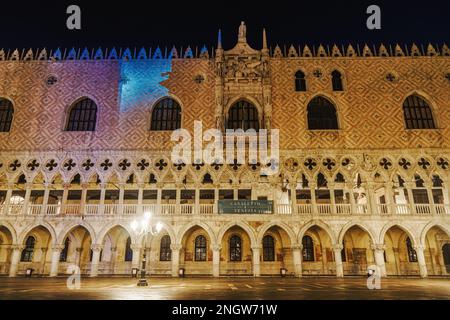 Venice Italy night view of illuminated Palazzo Ducale landmark, 1340 Doges Palace built in Venetian Gothic style at St. Marks square. Stock Photo