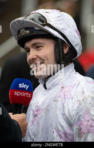 Ascot, Berkshire, UK. 18th February, 2023. Jockey Jonjo O'Neill Jr winner of the Ascot Racecourse Supports Schools Poetry Competition Novices' Hurdle Race (Class 2) at the Betfair Ascot Chase Raceday on Horse Springwell Bay. Owner Gay Smith. Trainer Jonjo P'Neill, Cheltenham. Breeder J R Weston. Sponsor Ashford Stud, Wasdell Group. Credit: Maureen McLean/Alamy Live News Stock Photo