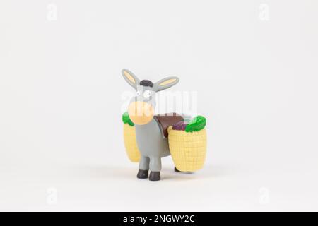 figure of a donkey, a children's toy on a white background Stock Photo