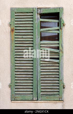 Broken window shutters in Tuscany, Italy Stock Photo