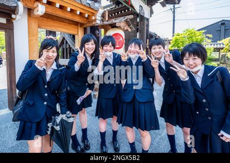 Kyoto Japan. Smiling students girls Stock Photo