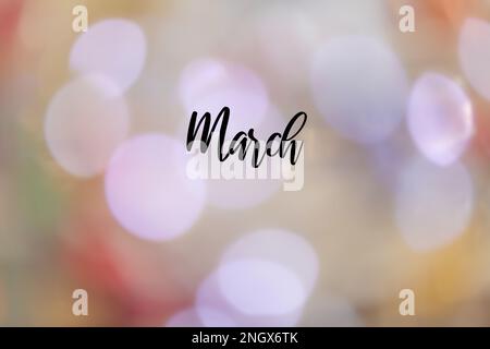 A blurred colorful background with the name 'March' in English written on it. Stock Photo