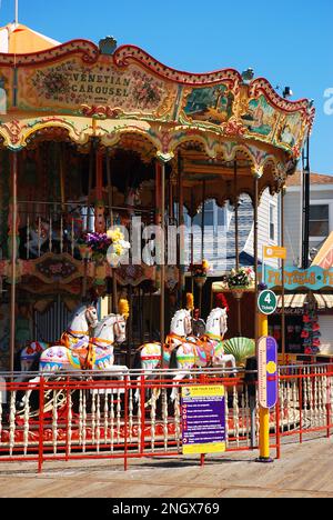 An antique carousel merry go round ride on the Boardwalk in Wildwood, New Jersey Stock Photo