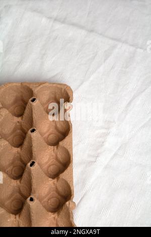photo of an empty egg carton on the table Stock Photo