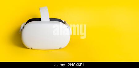 Virtual reality glasses on a yellow background. Concept of innovation, technology and business. Background banner Stock Photo