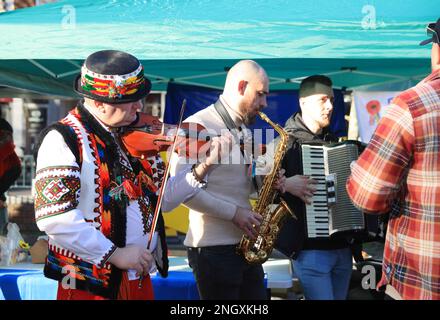 Chiswick monthly cheese market, this week with A Taste of Ukraine and Ukrainian music as the one year anniversary of the start of the Russian invasion approaches. Money was raised to support the ongoing crisis, supporting British-Ukrainan Aid and First Aid Ukraine, in west London, UK Stock Photo