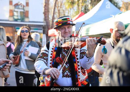 Chiswick monthly cheese market, this week with A Taste of Ukraine and Ukrainian music as the one year anniversary of the start of the Russian invasion approaches. Money was raised to support the ongoing crisis, supporting British-Ukrainan Aid and First Aid Ukraine, in west London, UK Stock Photo