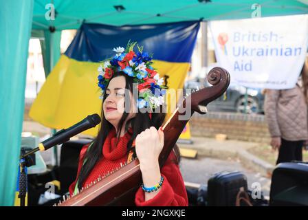 Chiswick monthly cheese market, this week with A Taste of Ukraine and Ukrainian music as the one year anniversary of the start of the Russian invasion approaches. Money was raised to support the ongoing crisis, supporting British-Ukrainan Aid and First Aid Ukraine, in west London, UK Stock Photo