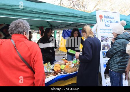 Chiswick monthly cheese market, this week with A Taste of Ukraine and Ukrainian music as the one year anniversary of the start of the Russian invasion approaches. Money was raised to support the ongoing crisis, supporting British-Ukrainan Aid and First Aid Ukraine, in west London, UK Stock Photo