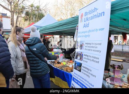 Chiswick monthly cheese market, this week with A Taste of Ukraine and Ukrainian music as the one year anniversary of the start of the Russian invasion approaches. Money was raised to support the ongoing crisis, supporting British-Ukrainan Aid and First Aid Ukraine, in west London, UK Stock Photo