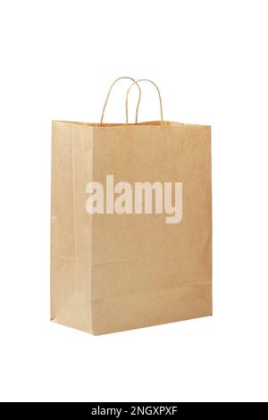 Paper bag. Kraft paper shopping bag. Brown folded paper bag with handle. Empty grocery paper bag. Recycled carton package for supermarket. Isolated on Stock Photo