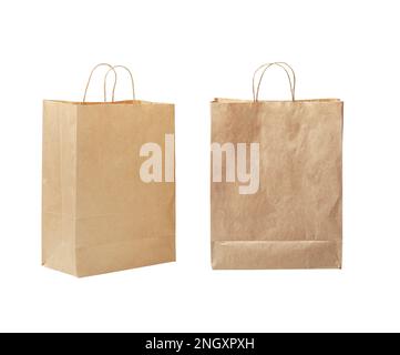 Paper bag. Kraft paper shopping bag. Brown folded paper bag with handle. Empty grocery paper bag. Recycled carton package for supermarket. Isolated on Stock Photo