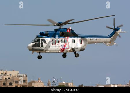 Valletta, Malta. 26th Sep, 2014. An Héli-Union Eurocopter AS 332L1 Super Puma seen at Malta international airport. Héli-Union is a leading helicopter services provider founded in 1961 in France. Heli-Union serves the helicopter industry by bringing world-leading solutions to military and civil organizations. The Eurocopter AS 332L1 Super Puma (or Airbus Helicopters H215) is a four-bladed, twin-engine, medium-size utility helicopter developed and initially produced by the French aerospace company Aérospatiale (Photo by Fabrizio Gandolfo/SOPA Images/Sipa USA) Credit: Sipa USA/Alamy Live News Stock Photo