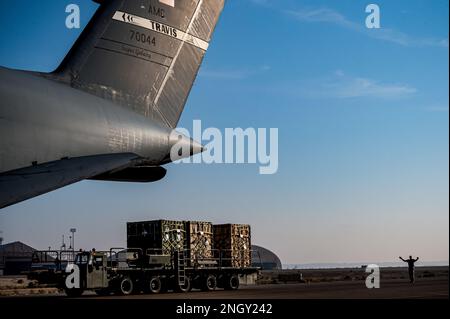 C 5 Galaxy Rear Ramp An airman marshals a C-5 Galaxy cargo aircraft through a crowded ...