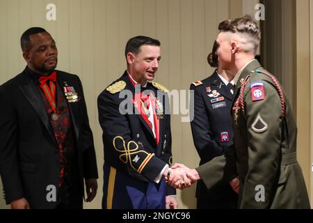 U.S. Paratroopers are greeted by Col. Daniel C. Gibson, commander of the 82nd Airborne Division Artillery Brigade, at a Saint Barbara's Day ball in Pinehurst, North Carolina, Dec. 1, 2022. The Saint Barbara ball is a tradition recognized by a formal celebration and presentation of awards honoring Saint Barbara, the patron saint of artillery branch personnel. Stock Photo