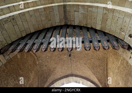 wooden portcullis with metal spikes at a medieval city gate in cologne Stock Photo