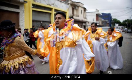 Sao Paulo, Brazil. 19th Feb, 2023. Bolivians Revelers dancing during the annual street block party know as 'Bolivian Carnival' Eon the third day of Carnival on February 19, 2023 in Sao Paulo, Brazil. According to the São Paulo City Council, during Carnival week more than 500 street blocks (blocos de rua) are held and more than 15 million people are expected to participate in them. Credit: Cris Faga/Alamy Live News Stock Photo