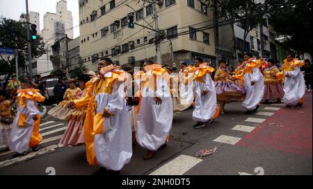 Sao Paulo, Brazil. 19th Feb, 2023. Bolivians Revelers dancing during the annual street block party know as 'Bolivian Carnival' Eon the third day of Carnival on February 19, 2023 in Sao Paulo, Brazil. According to the São Paulo City Council, during Carnival week more than 500 street blocks (blocos de rua) are held and more than 15 million people are expected to participate in them. Credit: Cris Faga/Alamy Live News Stock Photo