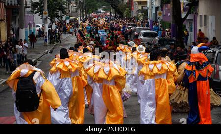 Sao Paulo, Brazil. 19th Feb, 2023. Bolivians Revelers dancing during the annual street block party know as 'Bolivian Carnival' Eon the third day of Carnival on February 19, 2023 in Sao Paulo, Brazil. According to the São Paulo City Council, during Carnival week more than 500 street blocks (blocos de rua) are held and more than 15 million people are expected to participate in them. Credit: Cris Faga/Alamy Live News Stock Photo