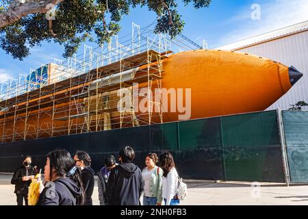 The Space Shuttle Endeavour at the California Science Center (ScienCenter), with tourists gathered nearby Stock Photo