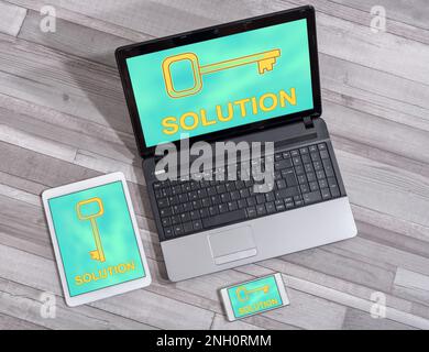 Solution concept shown on different information technology devices Stock Photo