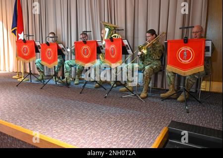 The Utah Army National Guard’s 23rd Army Band performs during the ceremony. The Utah Army National Guard welcomes its new command chief warrant officer during a change-of-responsibility ceremony, Dec. 5, 2022, in the Draper headquarters’ auditorium. During the ceremony, Command Chief Warrant Officer 5 Brian Searcy relinquishes the role of command chief of the Utah Army National Guard to Command Chief Warrant Officer 5 William Erickson. Stock Photo