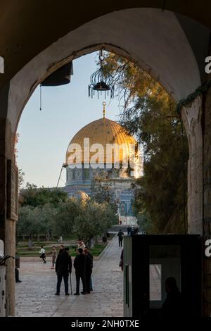 View of Dome of the Rock through Gate of Darkness, traditionally known as Gate of al-Dawadariya also known as King Faisal Gate located on the north side of the Temple Mount known to Muslims as the Haram esh-Sharif in the Old City of Jerusalem Israel Stock Photo