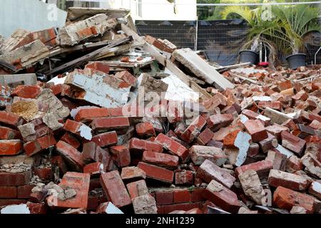 Pile of bricks at house demolition site in Brisbane Australia Stock Photo