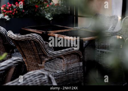 empty tables and chairs of street cafe. old-fashioned european  restaurant Stock Photo