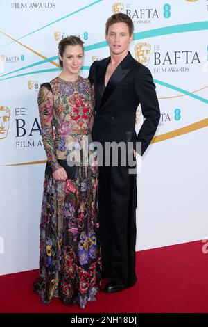 London, UK . 19 February, 2023 . Hannah Bagshaw and Eddie Redmayne on the red carpet of the  76th EE BAFTA Film Awards 2023 held at the Royal Festival Stock Photo