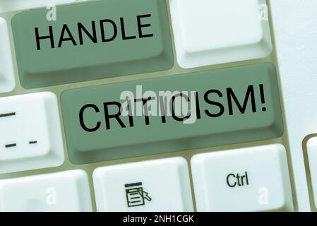 Sign displaying Handle Criticism, Word for process of withstanding valid and well reasoned opinions Stock Photo