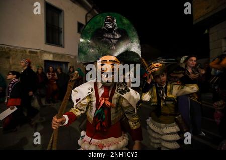 Verin, Ourense, Galicia, Spain. 19th Feb, 2023. During the ''Entroido'' festivities, as the carnival in Galicia is called, the Cigarrones, characters with traditional costumes and masks, enliven the streets while music and people in costumes pass by. February 19, 2022. Verin, Galicia, Spain. (Photo by Cristian Leyva/NurPhoto)0 Credit: NurPhoto SRL/Alamy Live News Stock Photo