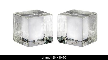 Crystal clear cool transparent ice cubes made of frozen water placed against white background Stock Photo