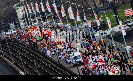 Cologne, Germany. 20th Feb, 2023. The Shrove Monday procession makes its way across the Deutzer Bridge. Cologne is hosting its first Shrove Monday procession in three years; in 2021 and 2022, the trains were canceled due to Corona. In 2022, there was instead a demonstration in Cologne against Russia's war of aggression on Ukraine. Credit: Rolf Vennenbernd/dpa/Alamy Live News Stock Photo