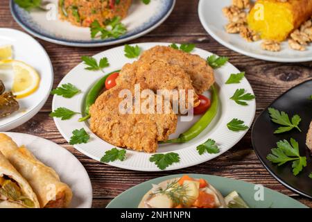Ramadan table. Turkish food on wooden background. Iftar and sahur delicacies. Turkish oriental dishes. Types of appetizers. close up Stock Photo
